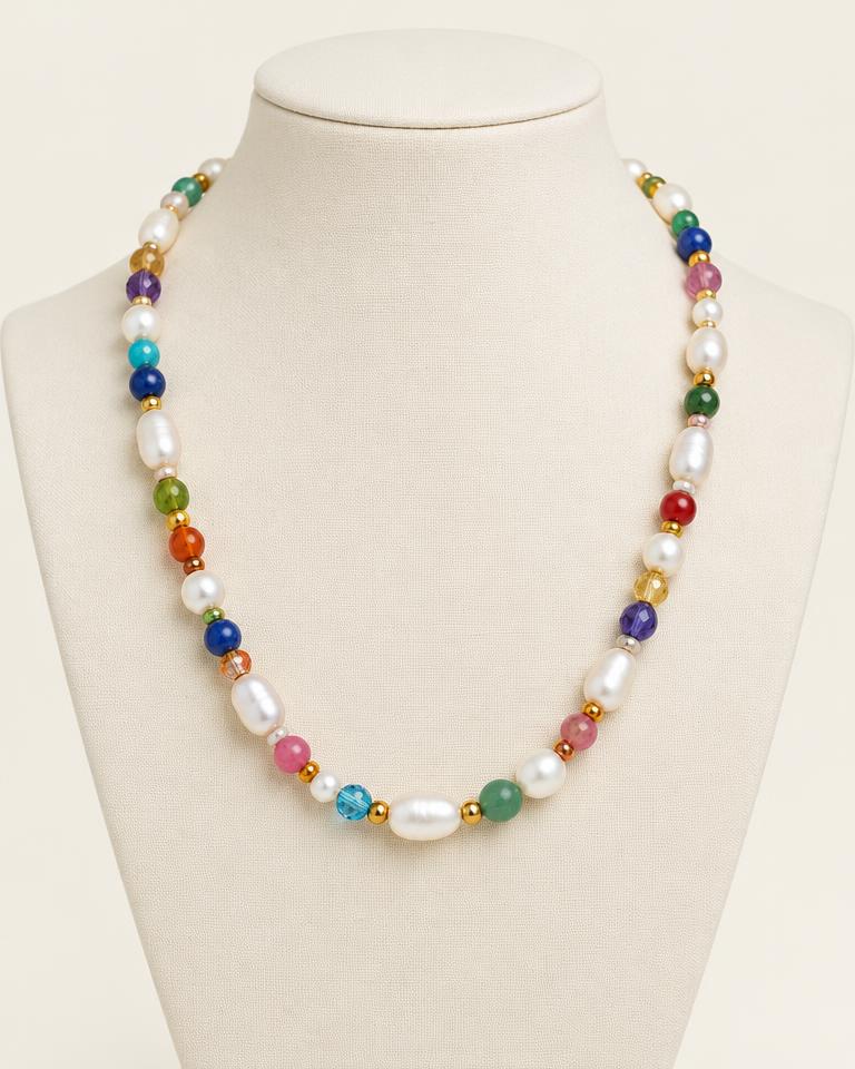 Pearl and multicolor bead necklace on a display bust