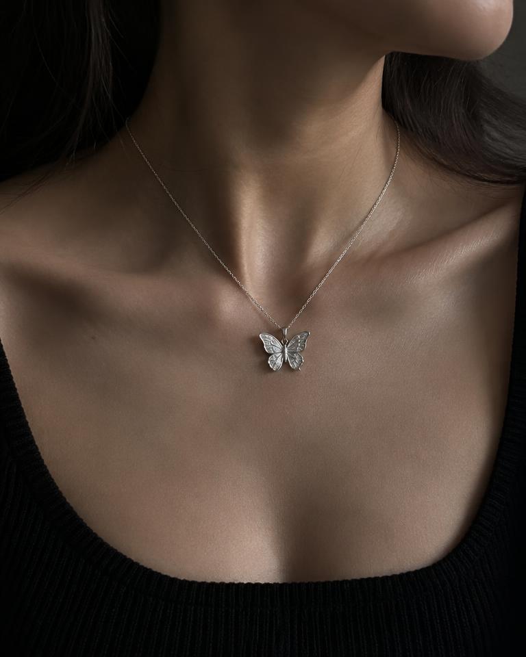 Silver butterfly pendant necklace